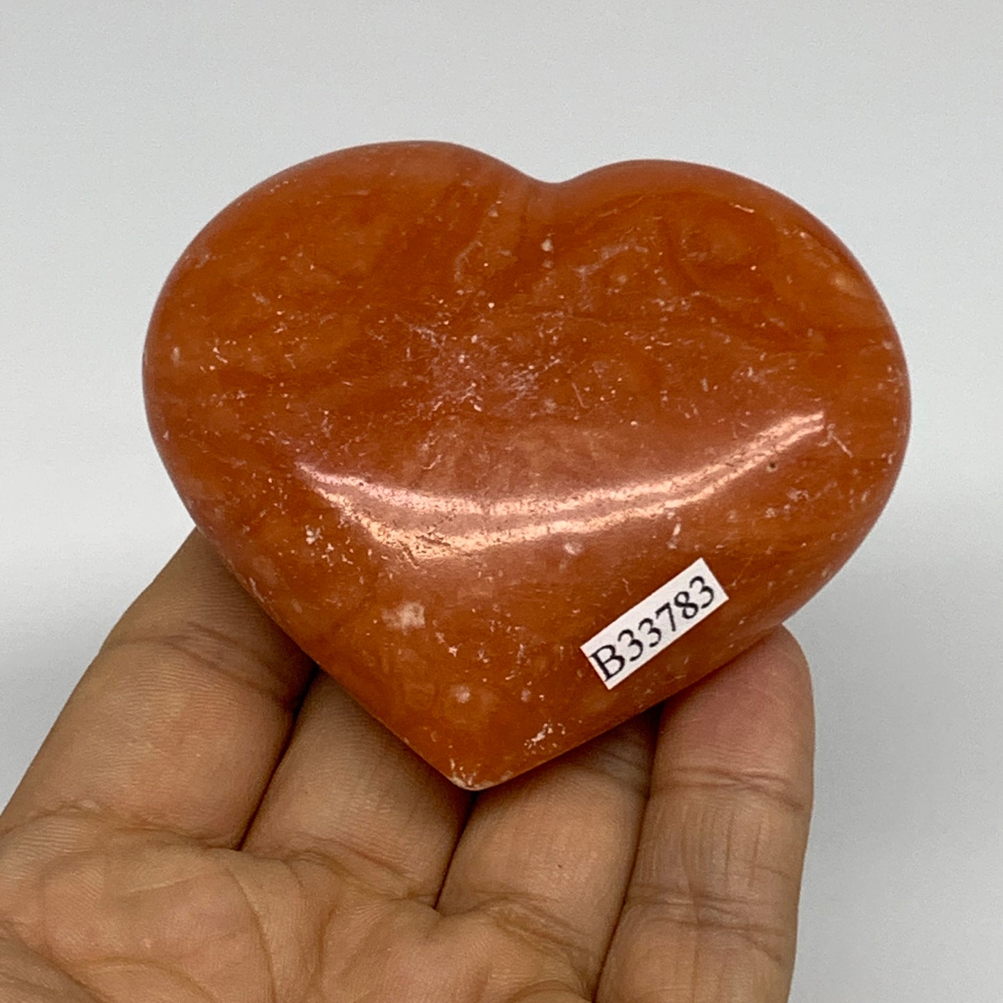 153g, 2.5"x2.8"x1.1" Orange Calcite Heart Gemstones from Madagascar, B33783