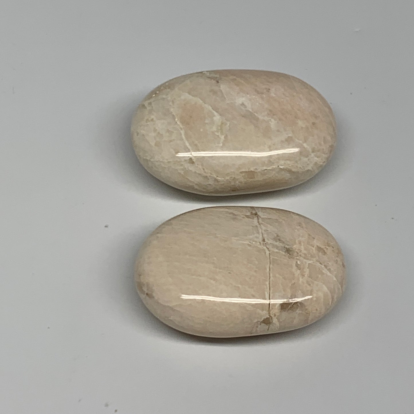 125.1g,2"-2.1", 2pcs, Peach Moonstone Crystal Palm-Stone Polished Reiki, B27969