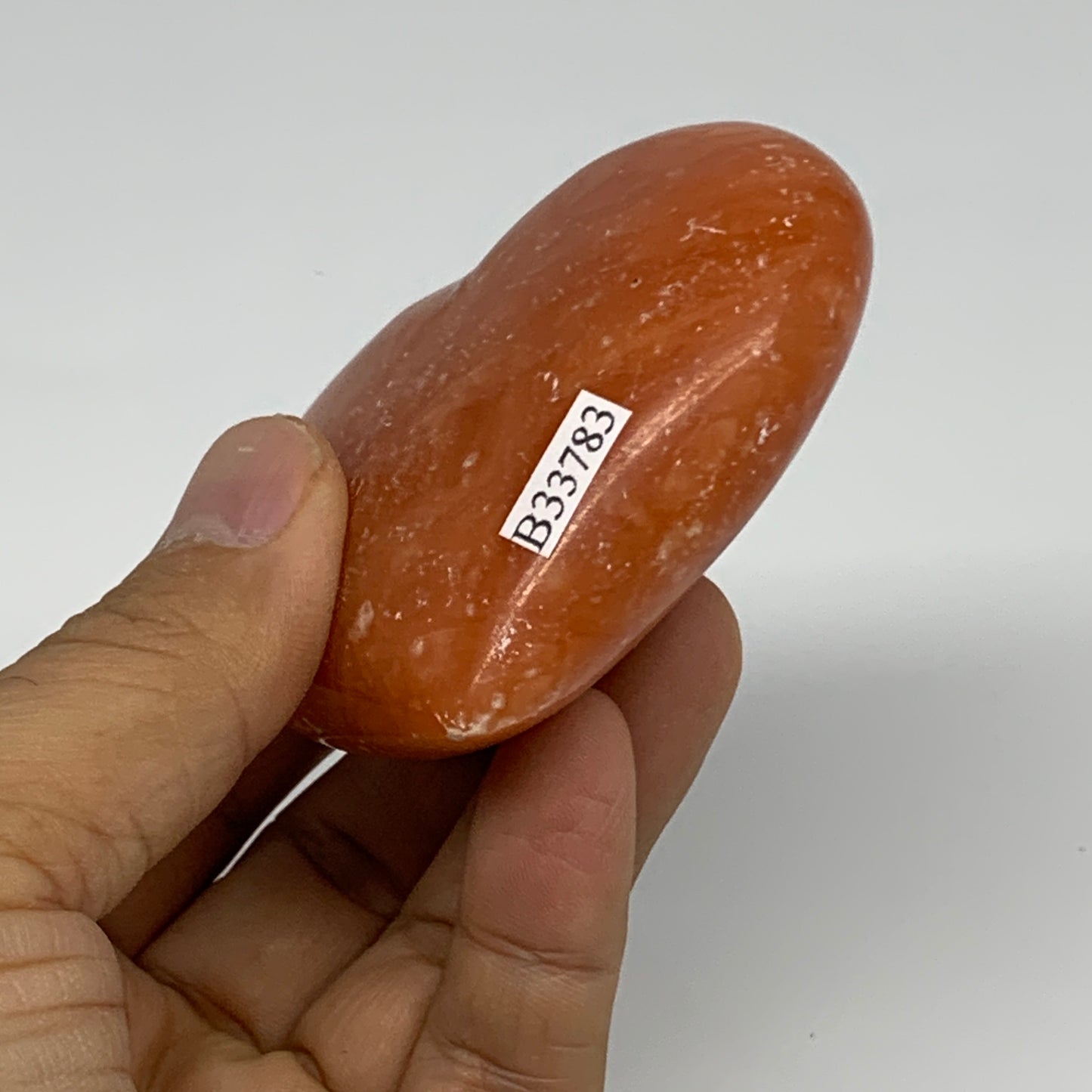 153g, 2.5"x2.8"x1.1" Orange Calcite Heart Gemstones from Madagascar, B33783