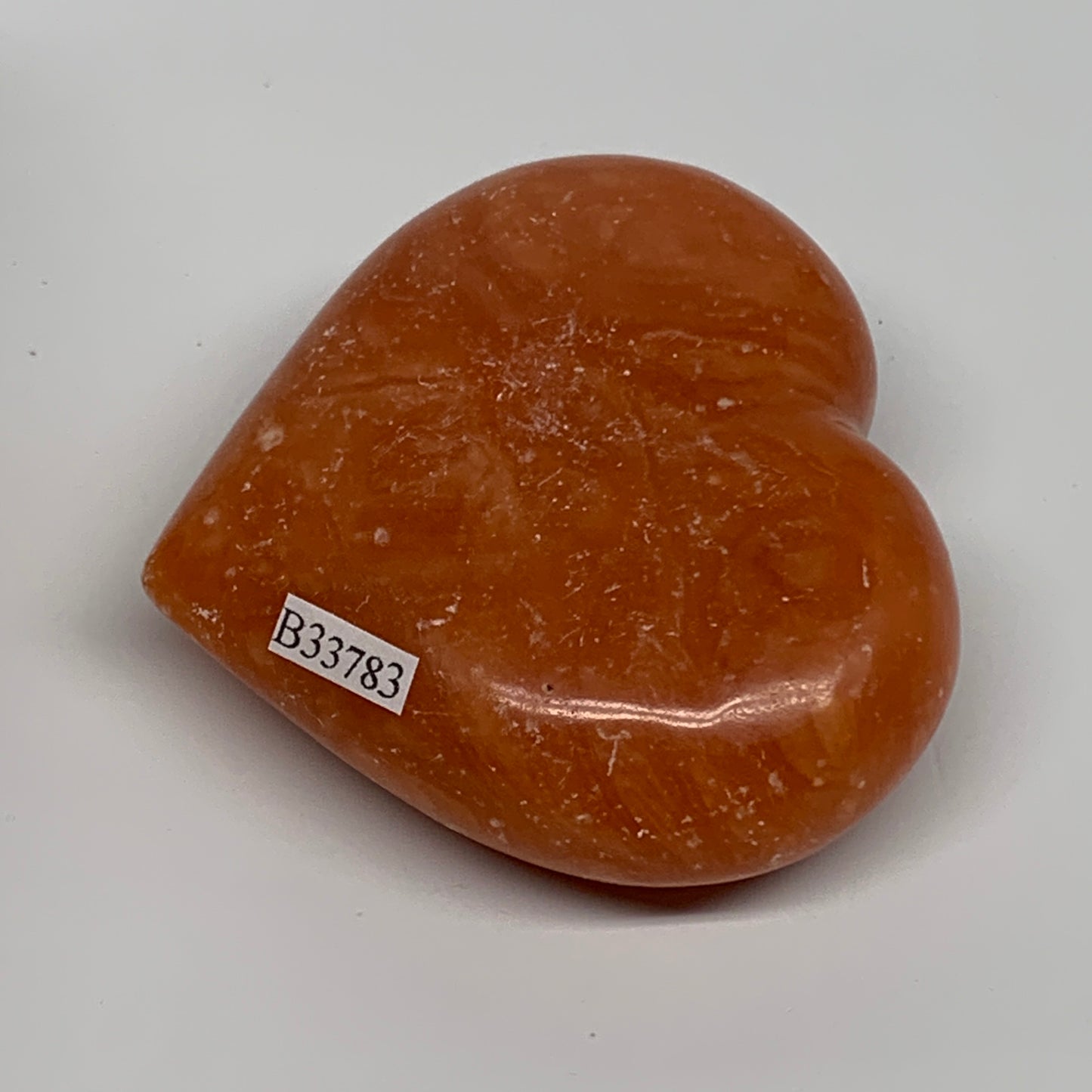 153g, 2.5"x2.8"x1.1" Orange Calcite Heart Gemstones from Madagascar, B33783