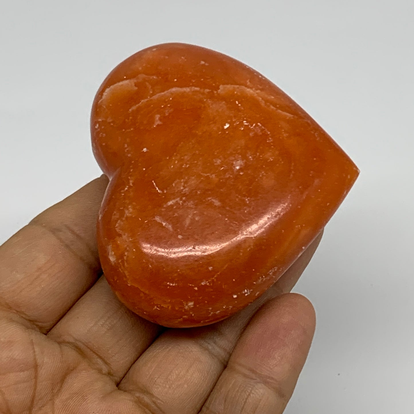 109.9g, 2.2"x2.6"x1" Orange Calcite Heart Gemstones from Madagascar, B33784