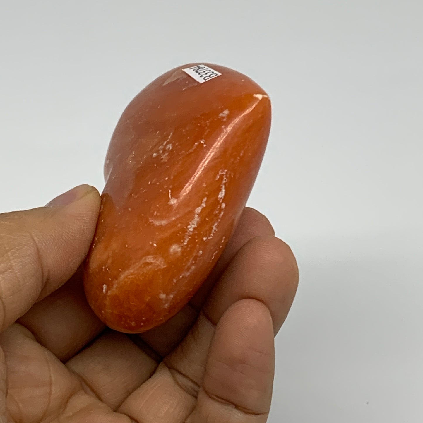 109.9g, 2.2"x2.6"x1" Orange Calcite Heart Gemstones from Madagascar, B33784