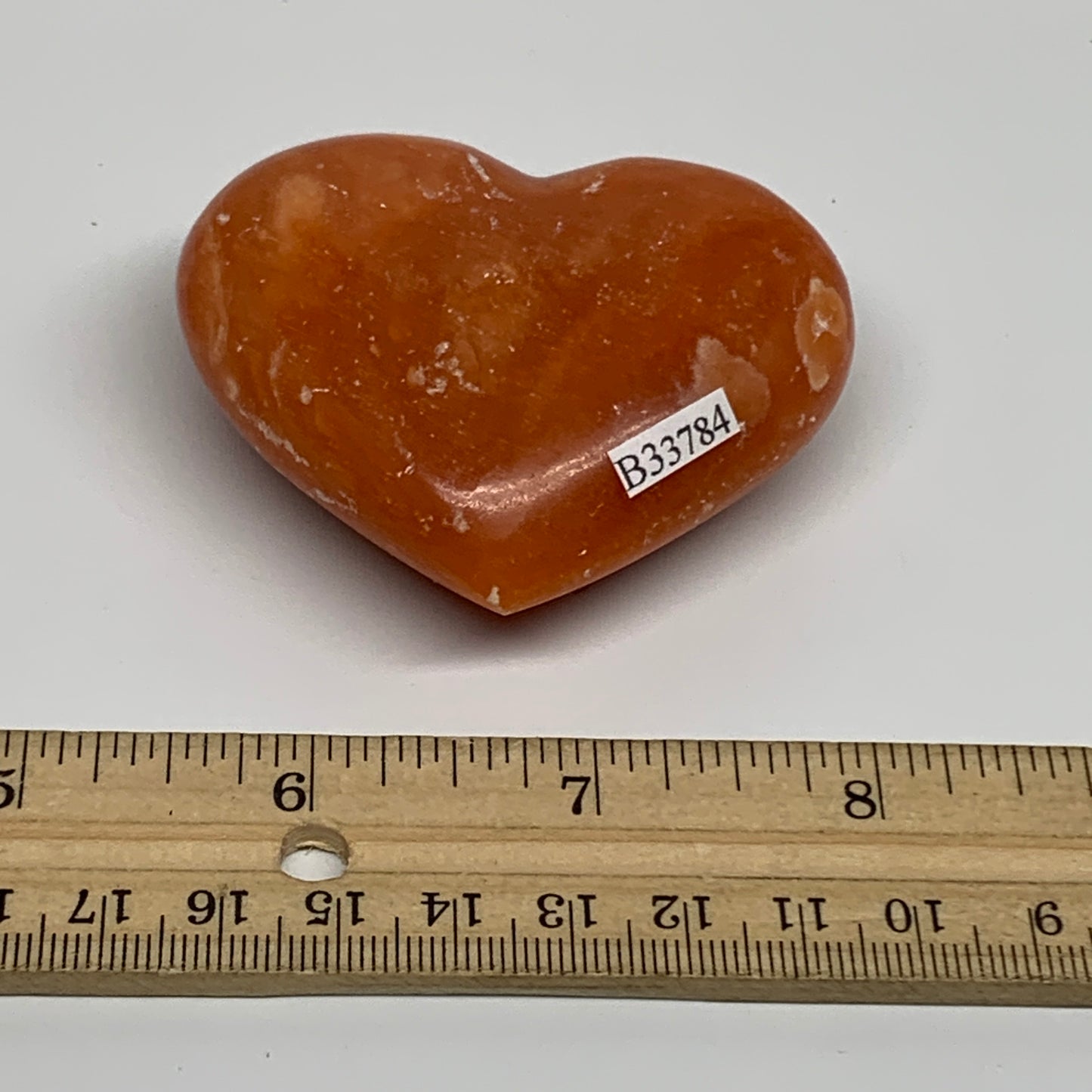 109.9g, 2.2"x2.6"x1" Orange Calcite Heart Gemstones from Madagascar, B33784