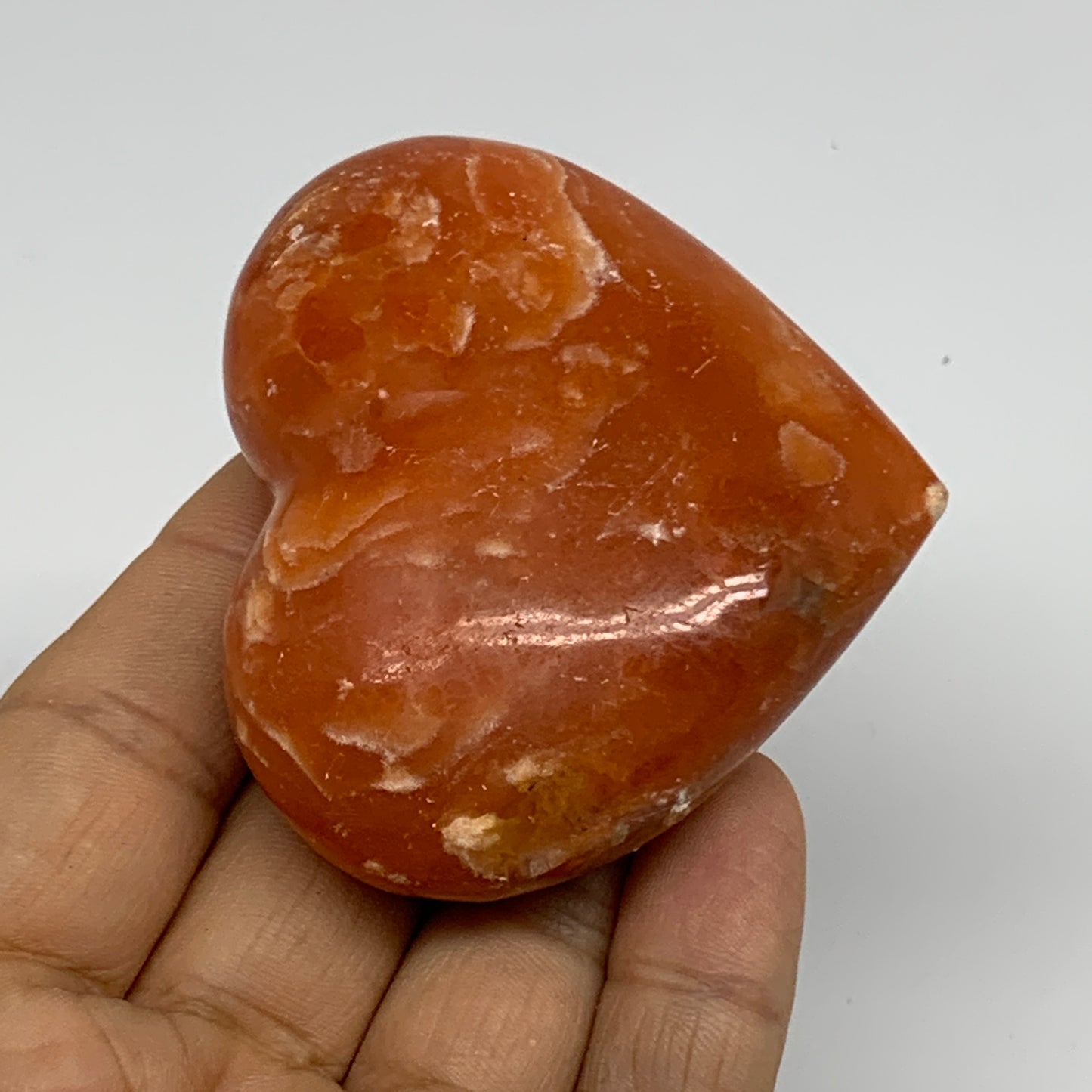 109.9g, 2.2"x2.6"x1" Orange Calcite Heart Gemstones from Madagascar, B33786