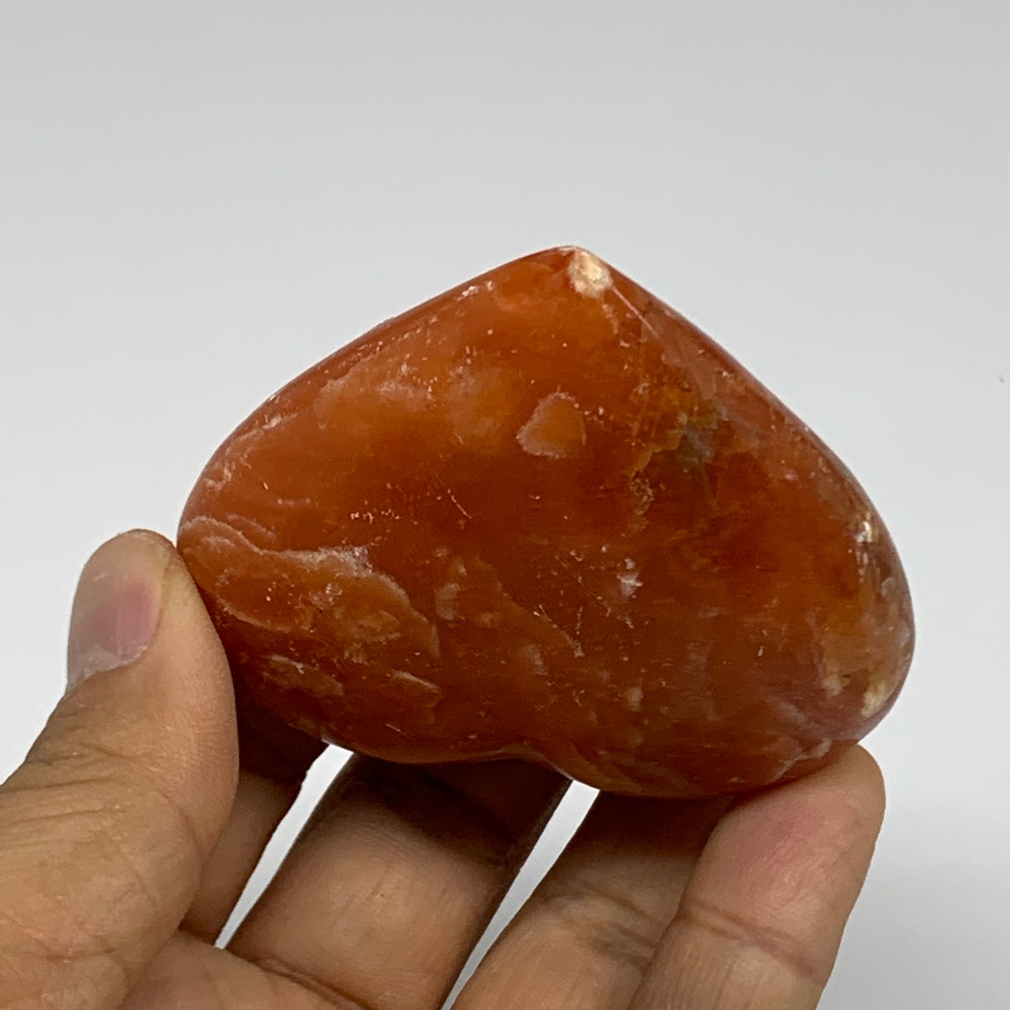 109.9g, 2.2"x2.6"x1" Orange Calcite Heart Gemstones from Madagascar, B33786