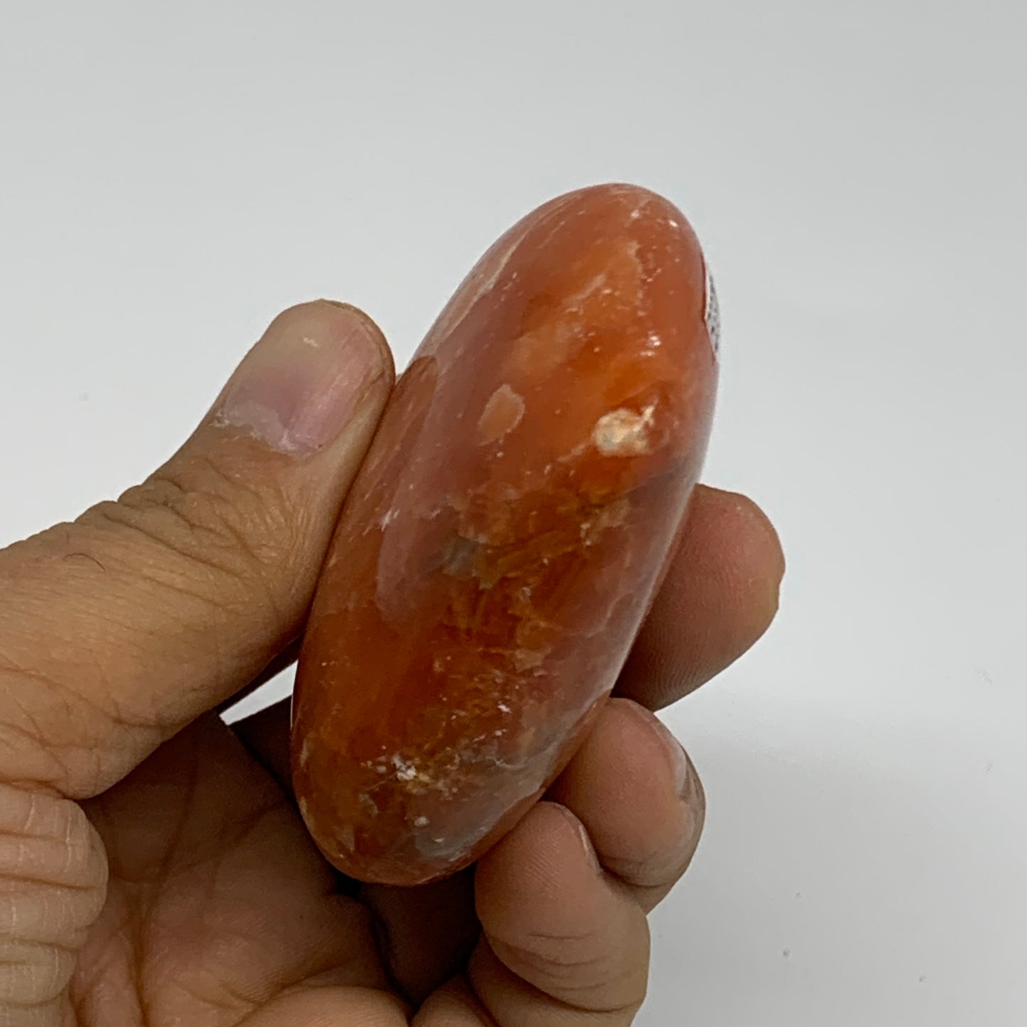 109.9g, 2.2"x2.6"x1" Orange Calcite Heart Gemstones from Madagascar, B33786