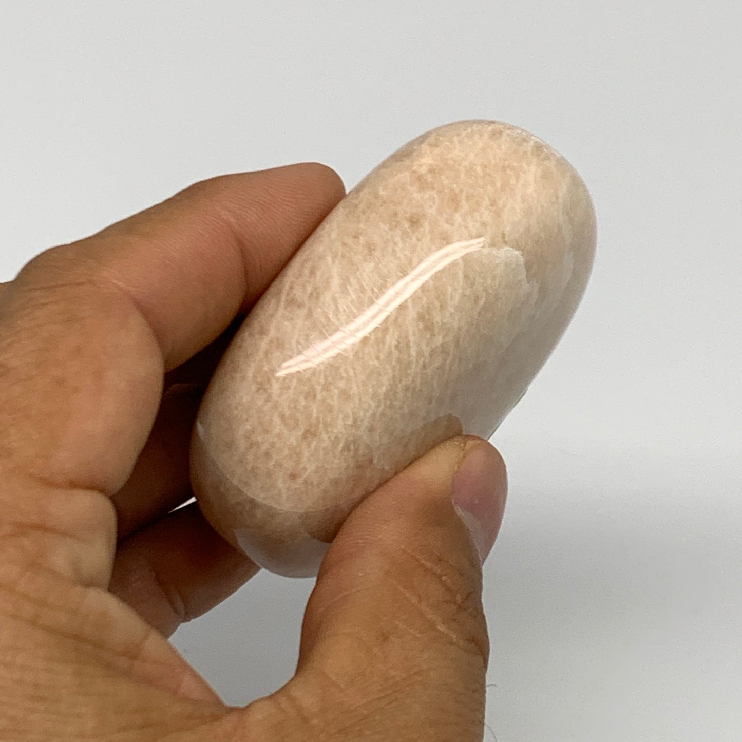 112.5g,2.3"x1.7"x1" Peach Moonstone Crystal Palm-Stone Polished Reiki, B27974