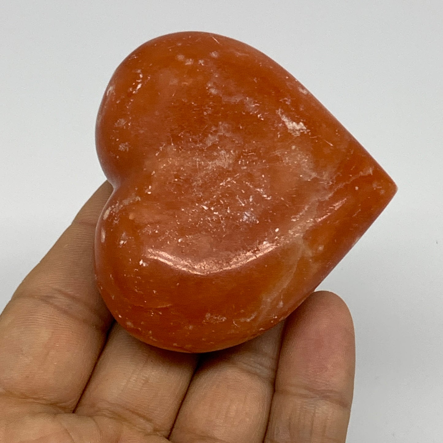 113.7g, 2.3"x2.6"x1" Orange Calcite Heart Gemstones from Madagascar, B33787