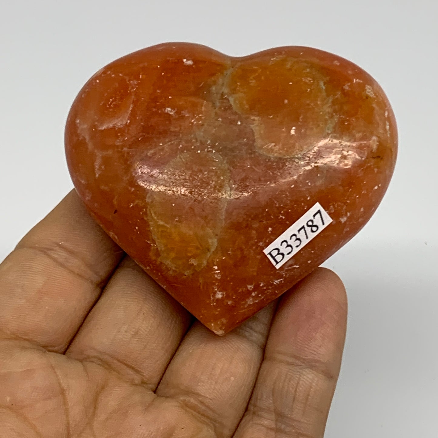 113.7g, 2.3"x2.6"x1" Orange Calcite Heart Gemstones from Madagascar, B33787