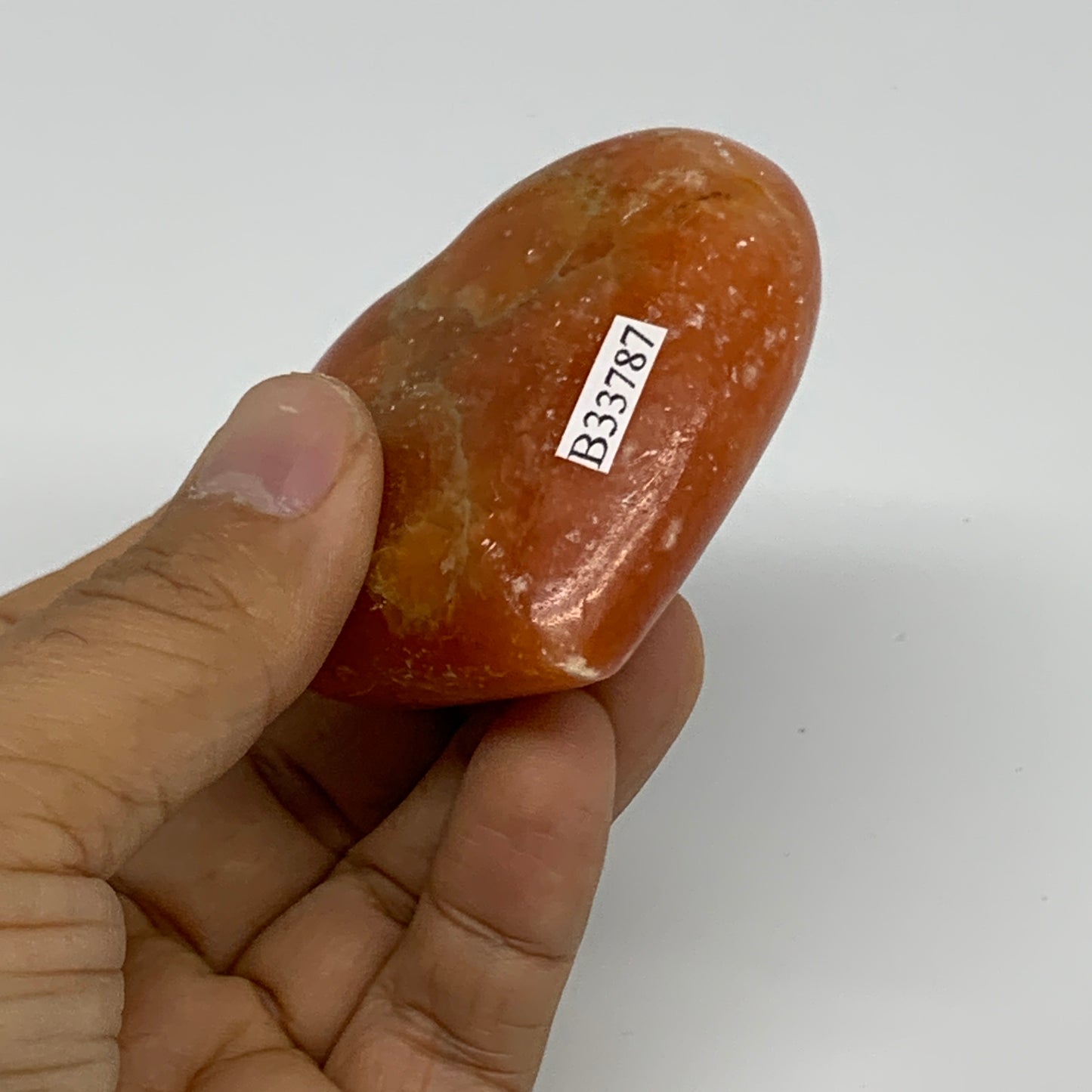 113.7g, 2.3"x2.6"x1" Orange Calcite Heart Gemstones from Madagascar, B33787