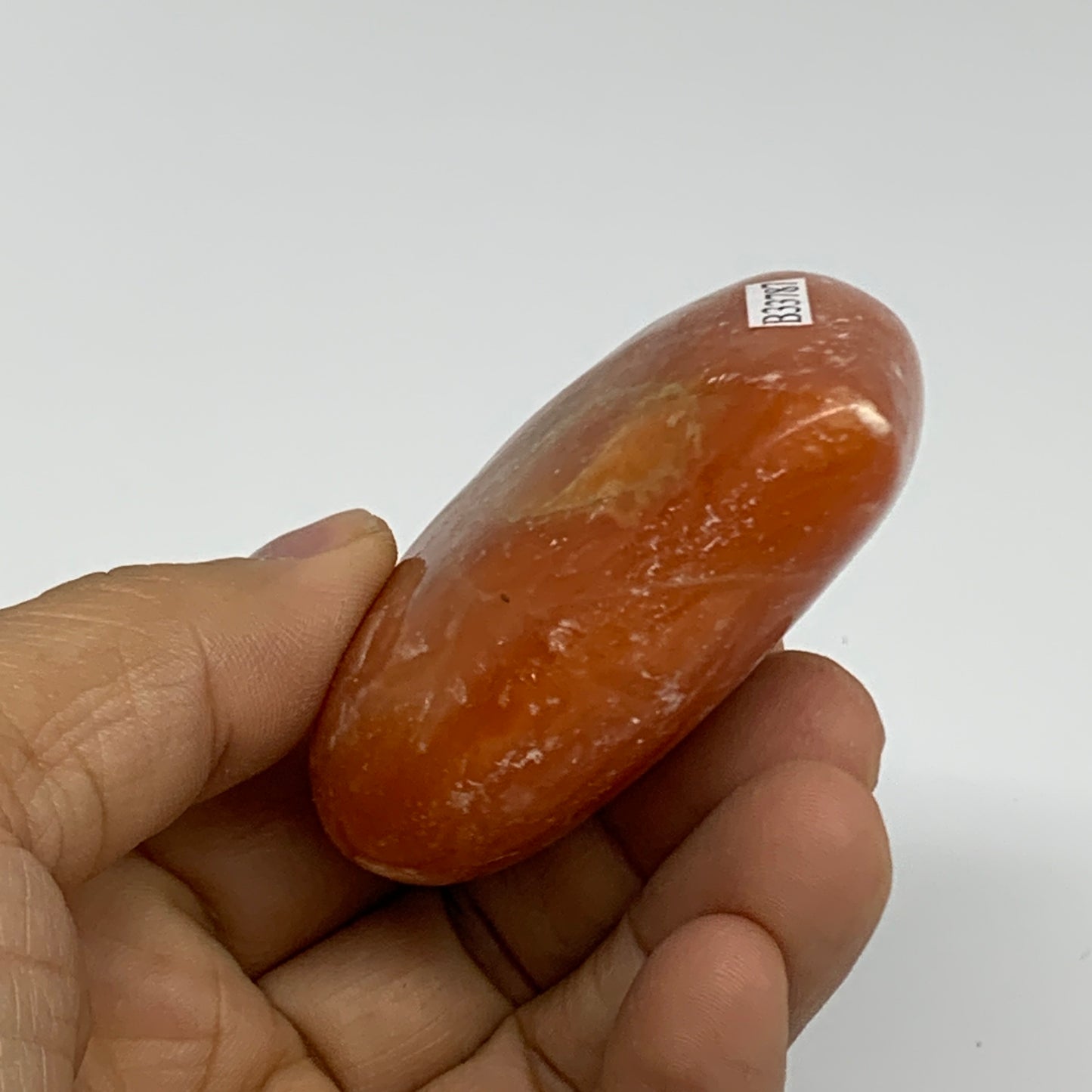 113.7g, 2.3"x2.6"x1" Orange Calcite Heart Gemstones from Madagascar, B33787