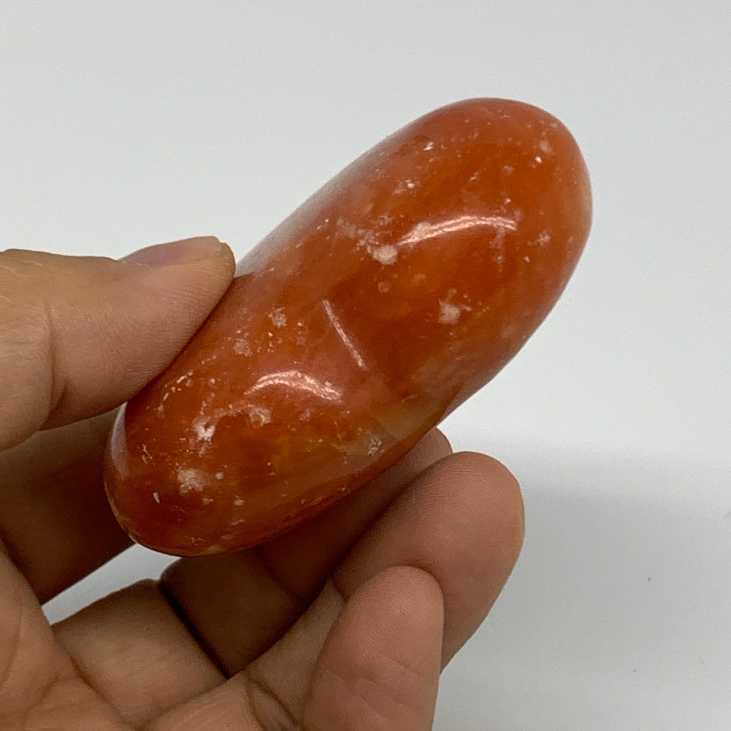 113.7g, 2.3"x2.6"x1" Orange Calcite Heart Gemstones from Madagascar, B33787