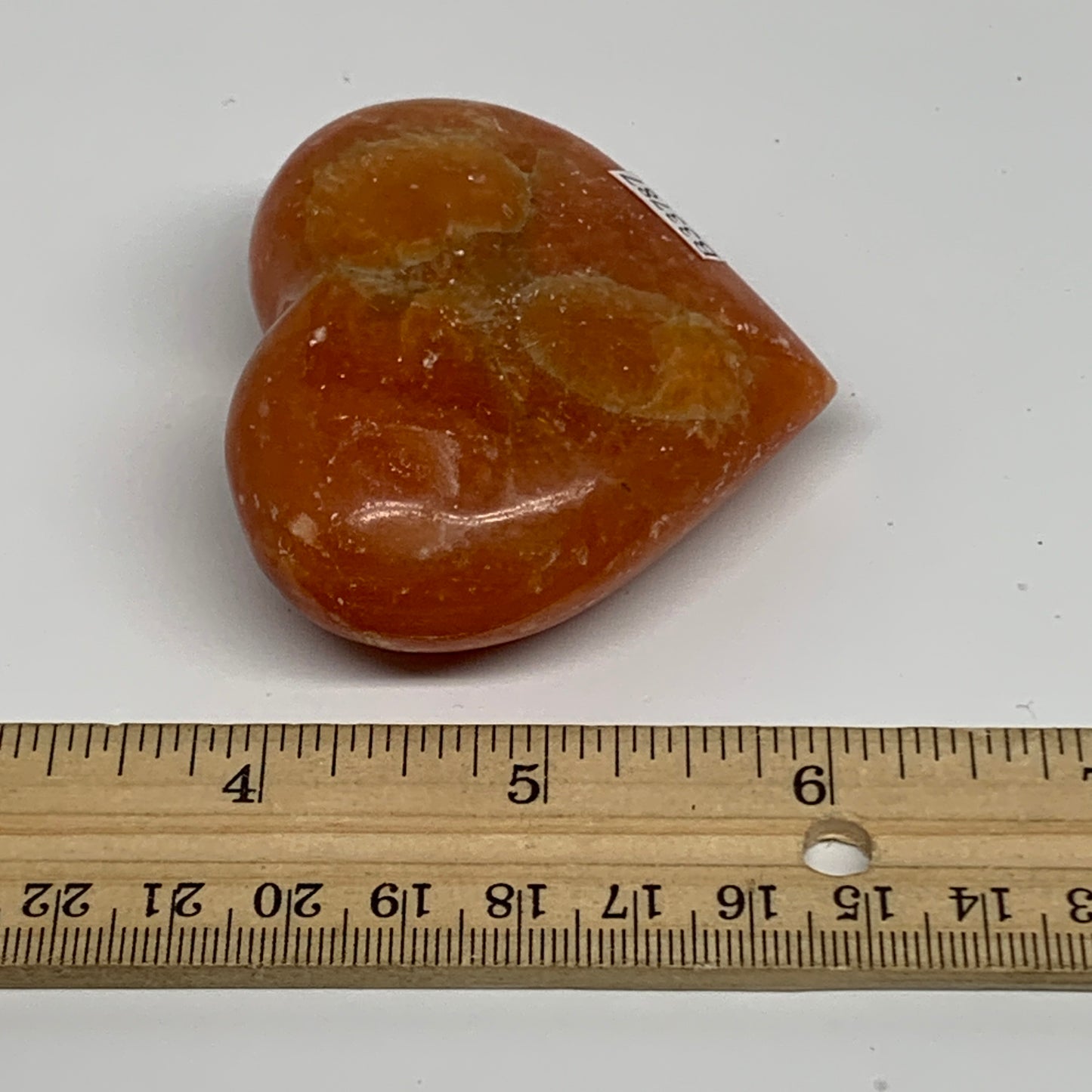 113.7g, 2.3"x2.6"x1" Orange Calcite Heart Gemstones from Madagascar, B33787