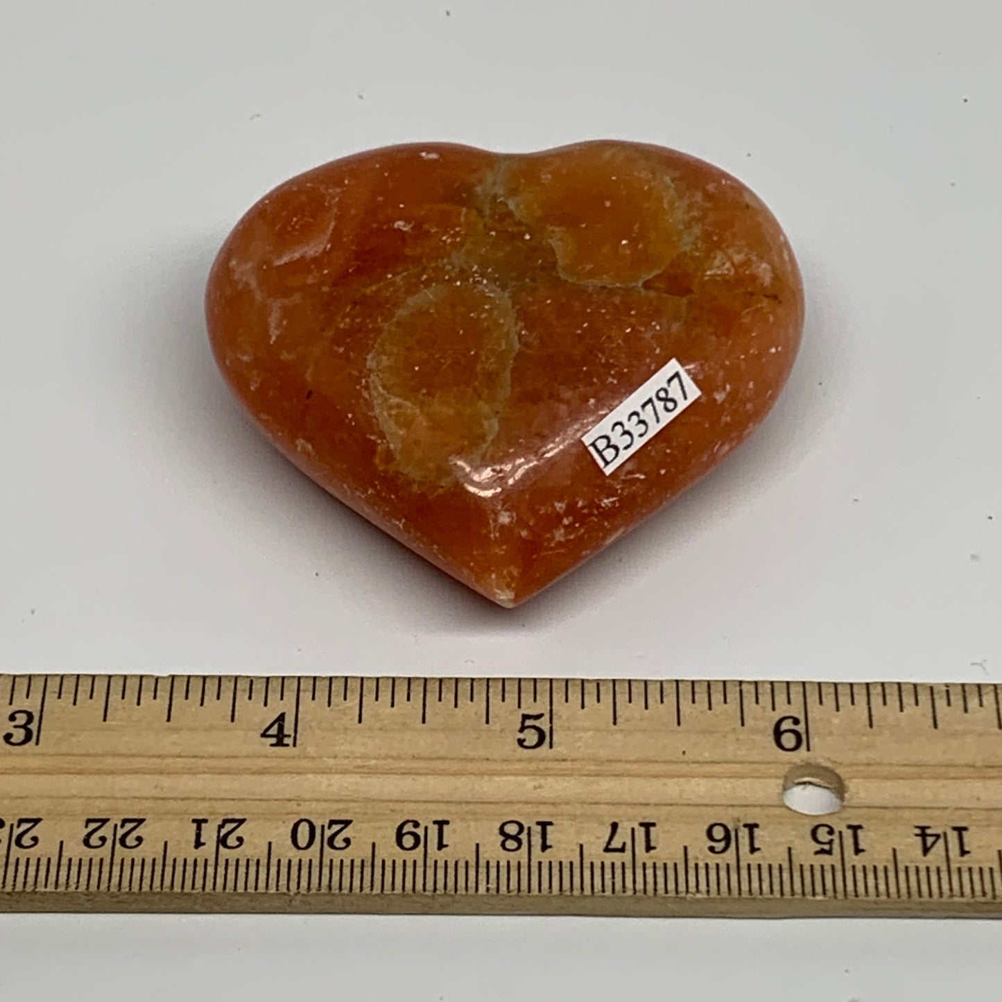 113.7g, 2.3"x2.6"x1" Orange Calcite Heart Gemstones from Madagascar, B33787