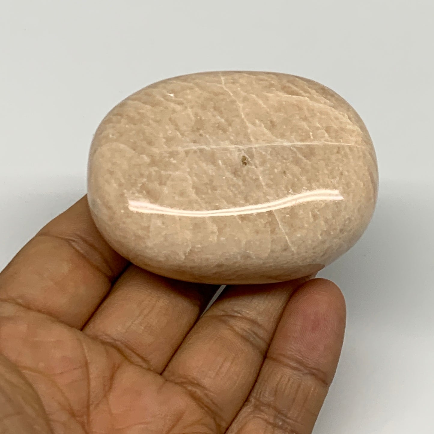 122.8g,2.4"x1.8"x0.9" Peach Moonstone Crystal Palm-Stone Polished Reiki, B27976