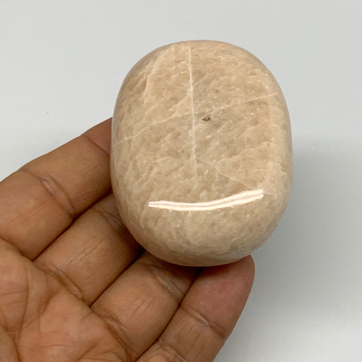 122.8g,2.4"x1.8"x0.9" Peach Moonstone Crystal Palm-Stone Polished Reiki, B27976