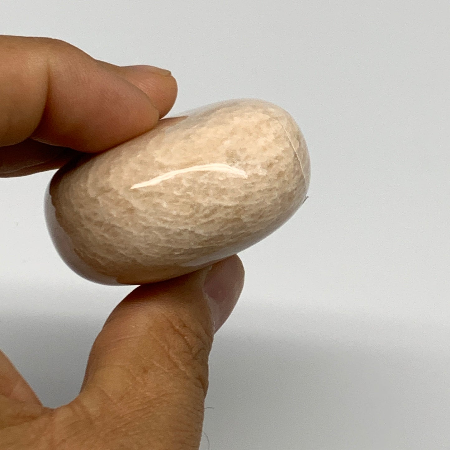 122.8g,2.4"x1.8"x0.9" Peach Moonstone Crystal Palm-Stone Polished Reiki, B27976