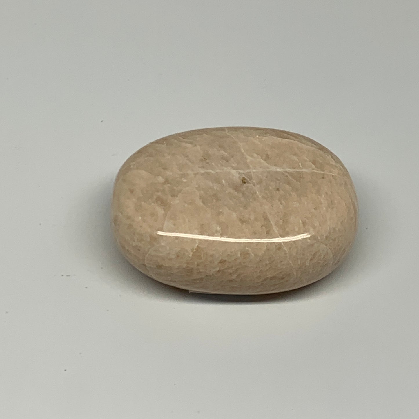 122.8g,2.4"x1.8"x0.9" Peach Moonstone Crystal Palm-Stone Polished Reiki, B27976