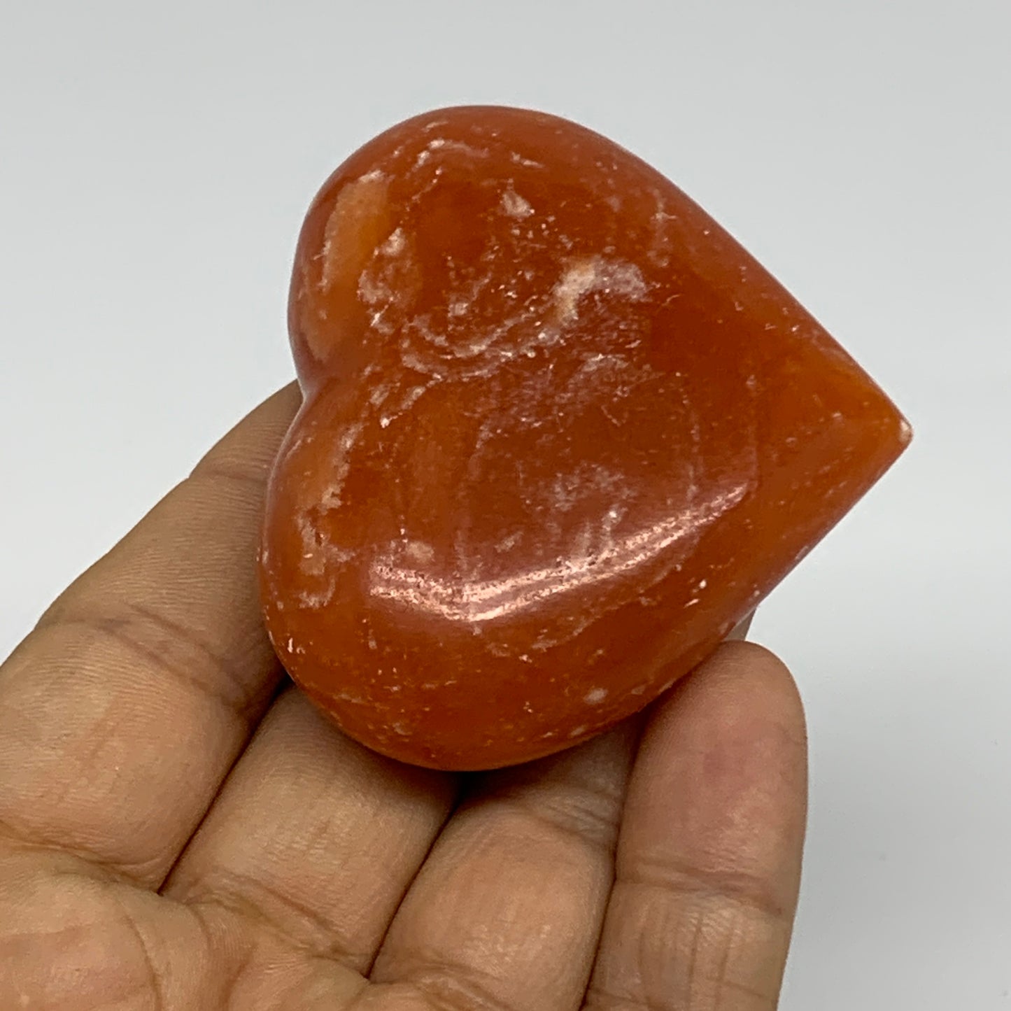 89.4g, 2"x2.4"x1" Orange Calcite Heart Gemstones from Madagascar, B33790