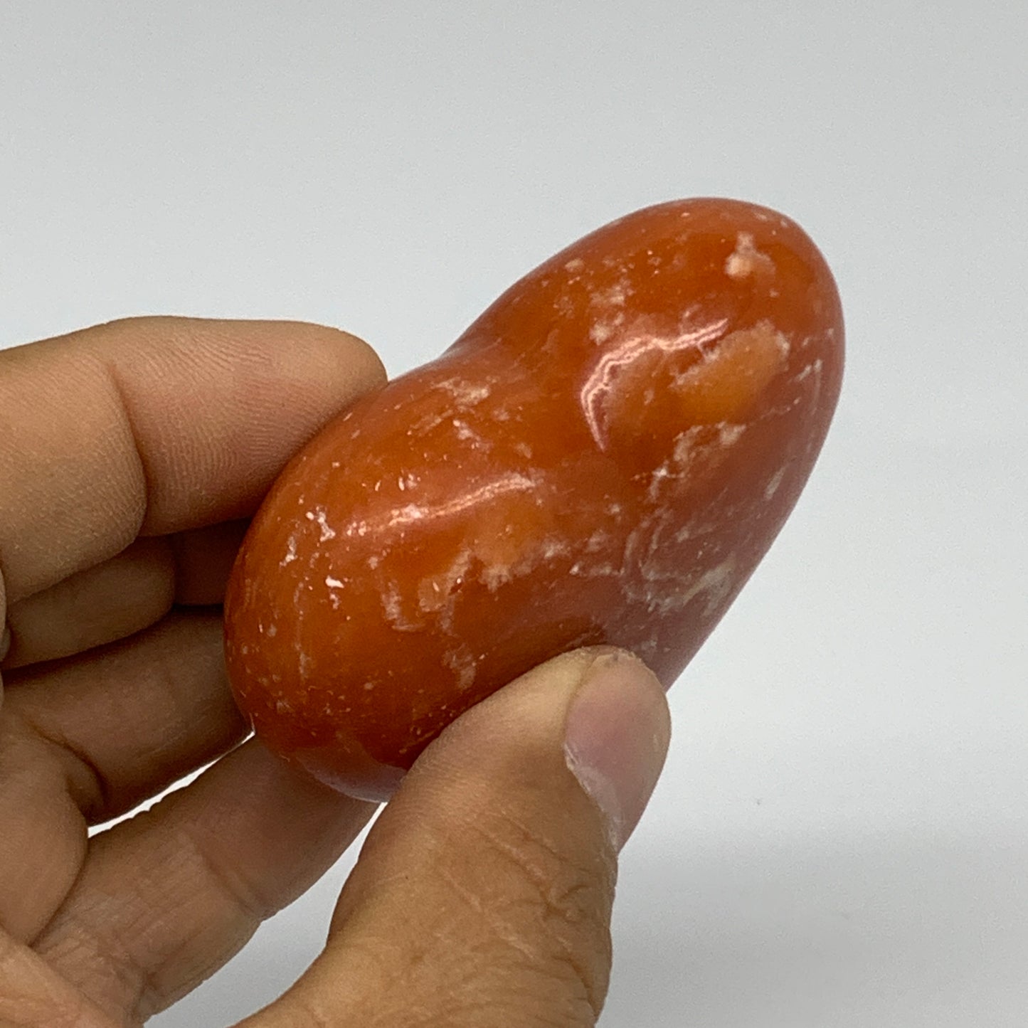 89.4g, 2"x2.4"x1" Orange Calcite Heart Gemstones from Madagascar, B33790