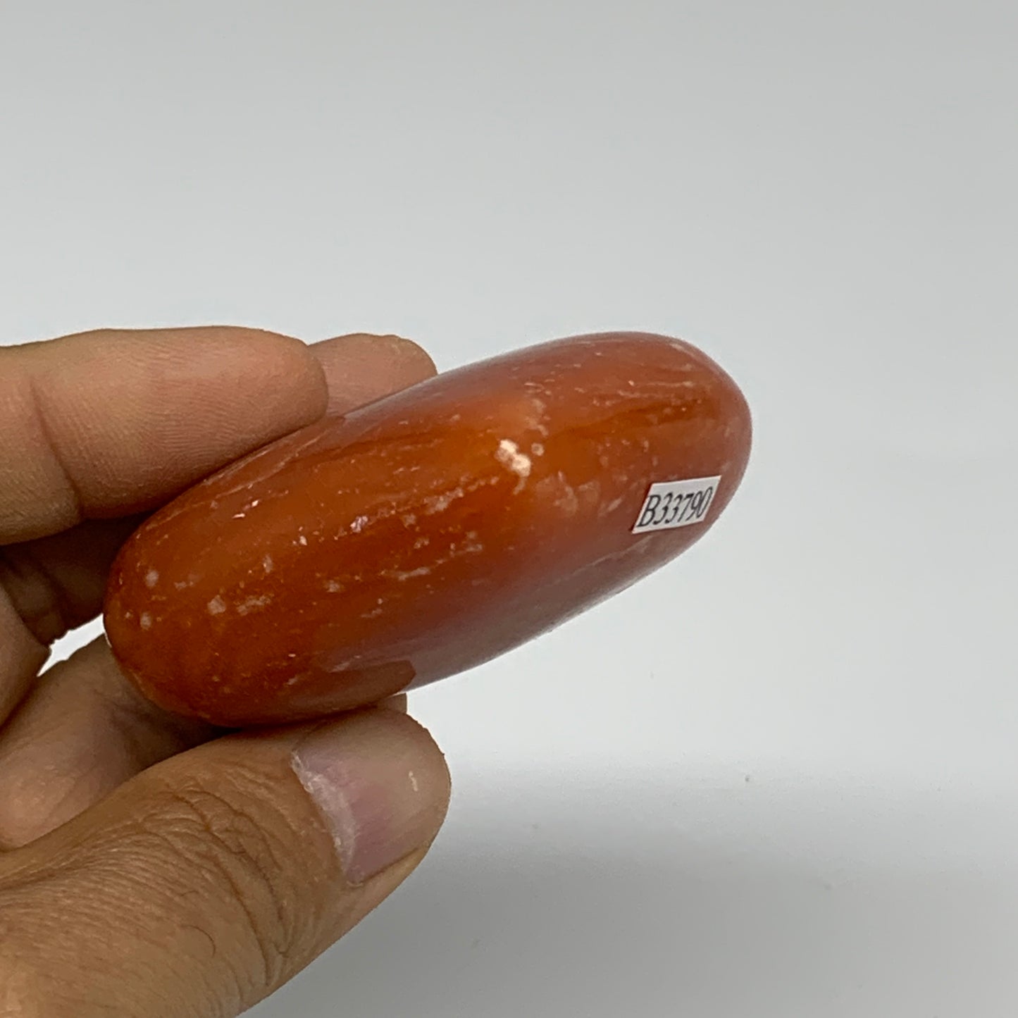 89.4g, 2"x2.4"x1" Orange Calcite Heart Gemstones from Madagascar, B33790