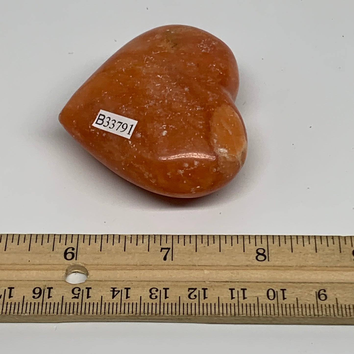 97.4g, 2.1"x2.4"x1" Orange Calcite Heart Gemstones from Madagascar, B33791