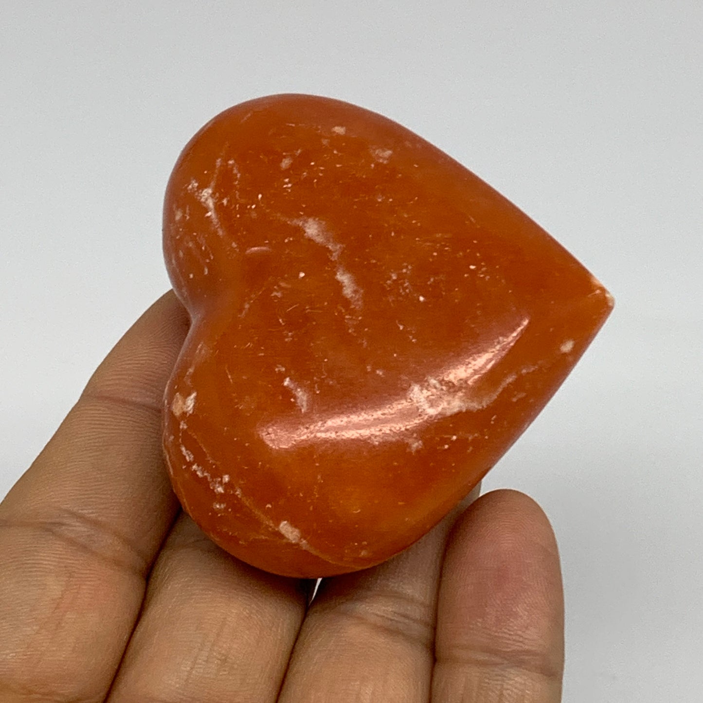 90.3g, 2.1"x2.4"x1" Orange Calcite Heart Gemstones from Madagascar, B33792