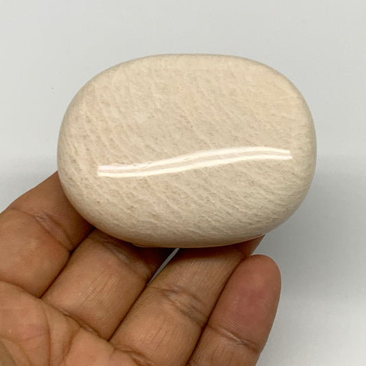 113.7g,2.4"x1.9"x0.9" Peach Moonstone Crystal Palm-Stone Polished Reiki, B27980