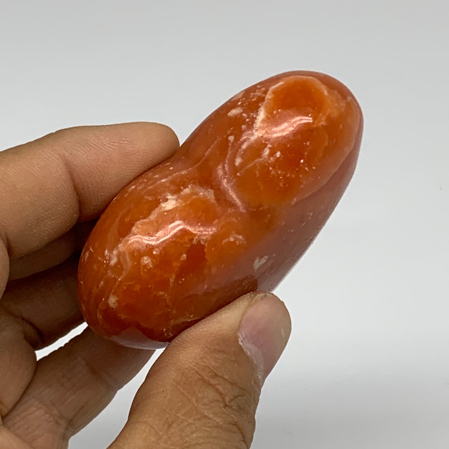 90.3g, 2.1"x2.4"x1" Orange Calcite Heart Gemstones from Madagascar, B33792