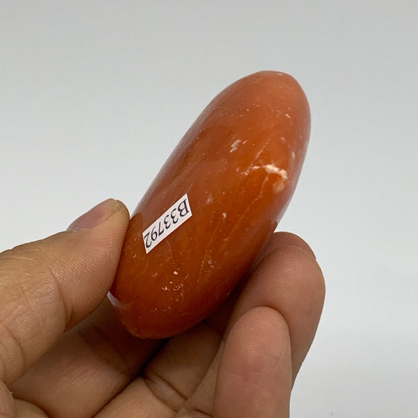 90.3g, 2.1"x2.4"x1" Orange Calcite Heart Gemstones from Madagascar, B33792