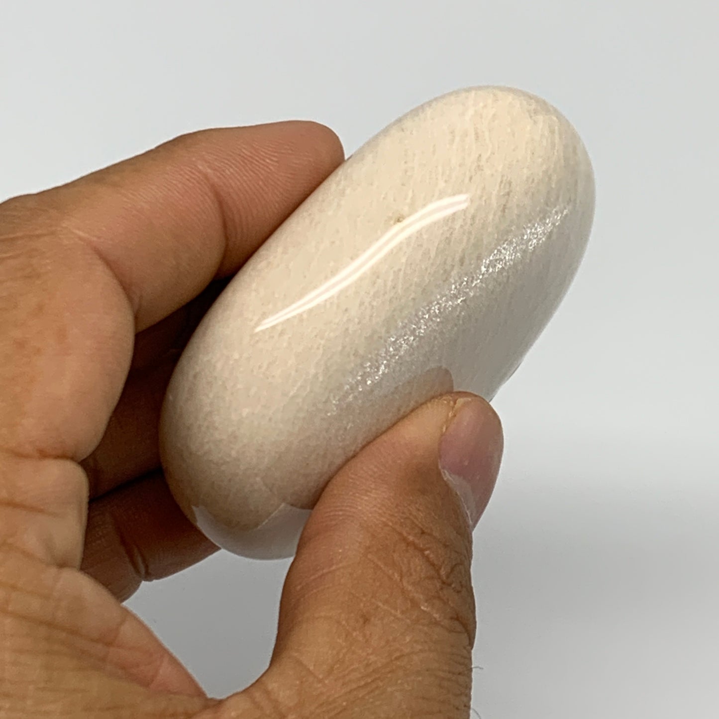 113.7g,2.4"x1.9"x0.9" Peach Moonstone Crystal Palm-Stone Polished Reiki, B27980