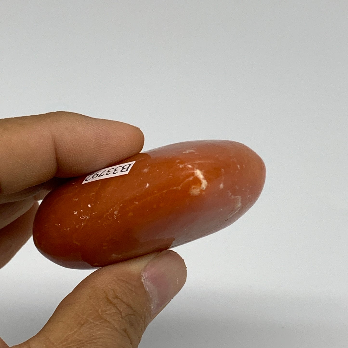 90.3g, 2.1"x2.4"x1" Orange Calcite Heart Gemstones from Madagascar, B33792