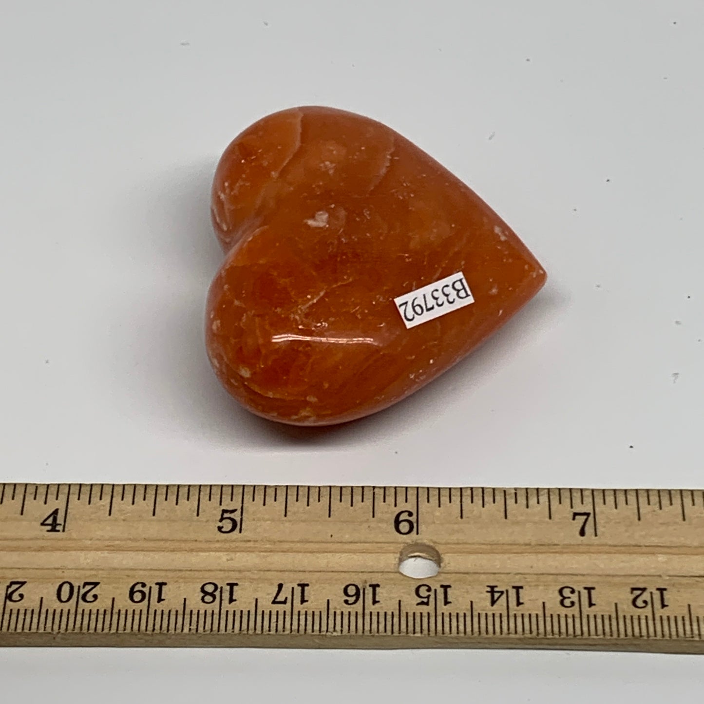 90.3g, 2.1"x2.4"x1" Orange Calcite Heart Gemstones from Madagascar, B33792