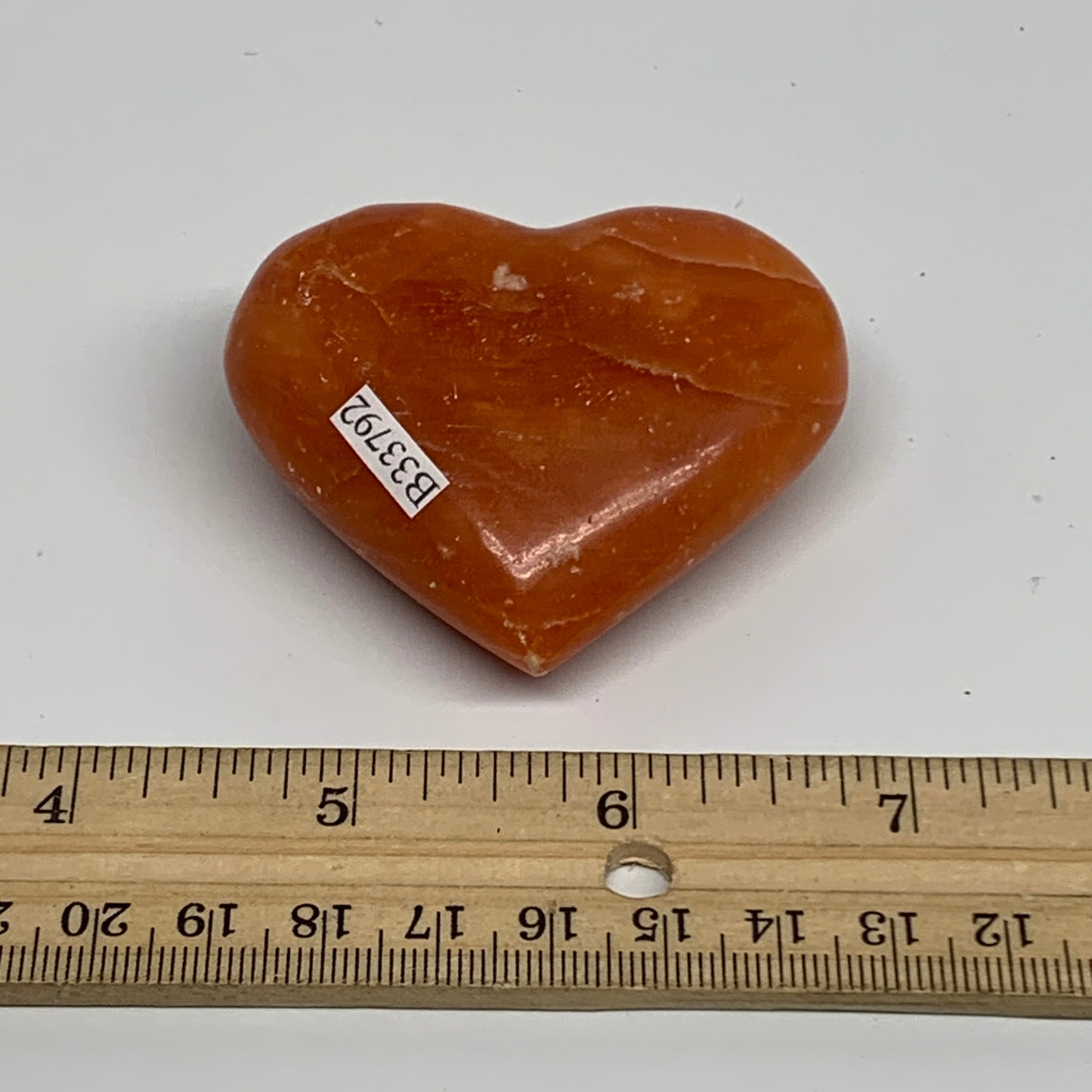 90.3g, 2.1"x2.4"x1" Orange Calcite Heart Gemstones from Madagascar, B33792