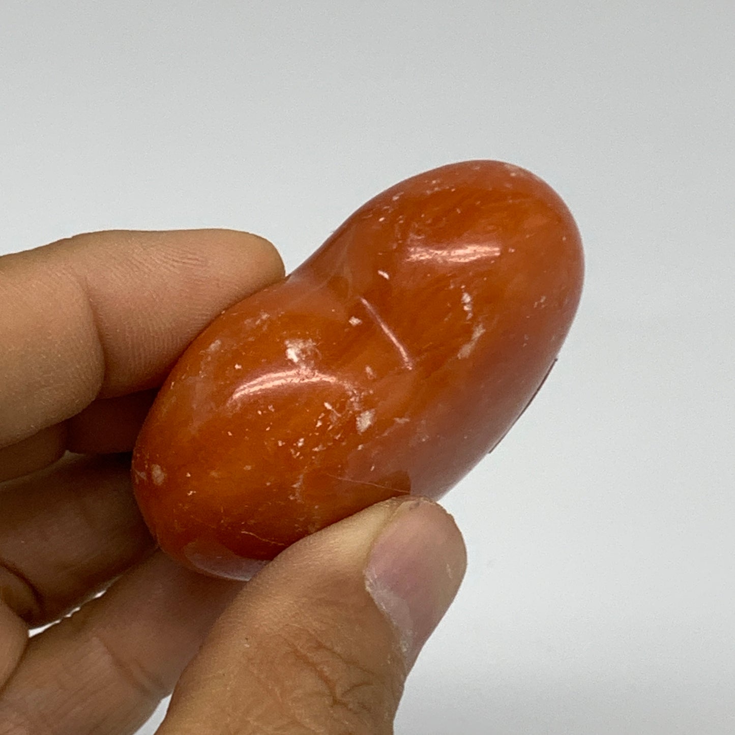 67.7g, 1.8"x2.1"x0.9" Orange Calcite Heart Gemstones from Madagascar, B33794