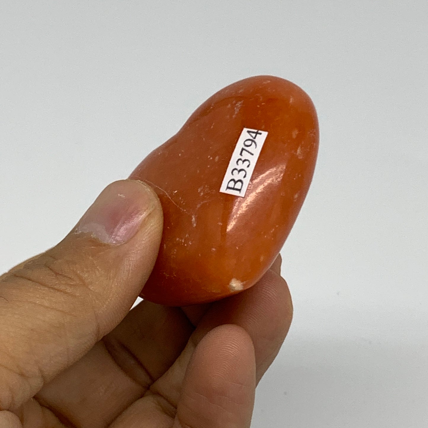 67.7g, 1.8"x2.1"x0.9" Orange Calcite Heart Gemstones from Madagascar, B33794