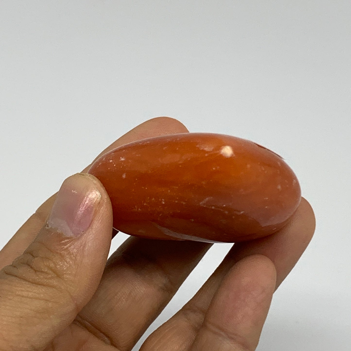 67.7g, 1.8"x2.1"x0.9" Orange Calcite Heart Gemstones from Madagascar, B33794