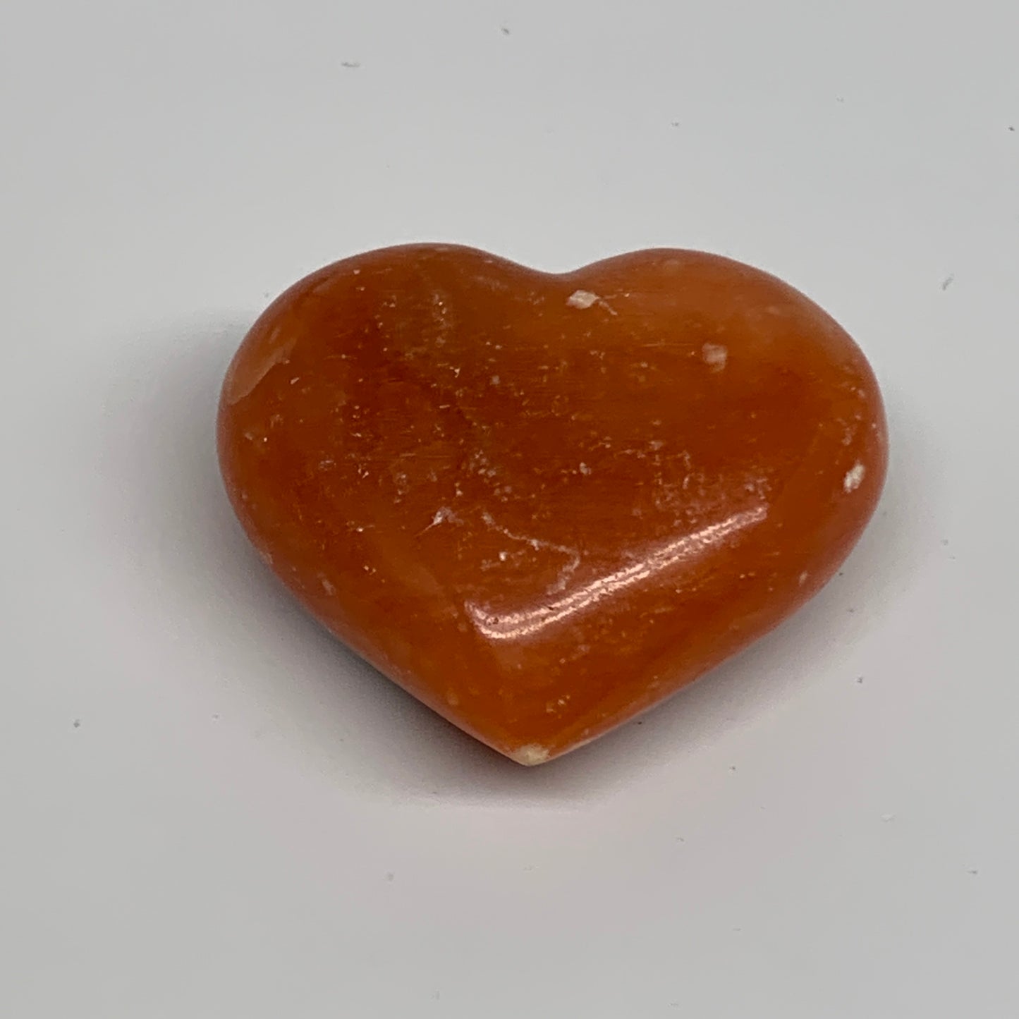 67.7g, 1.8"x2.1"x0.9" Orange Calcite Heart Gemstones from Madagascar, B33794