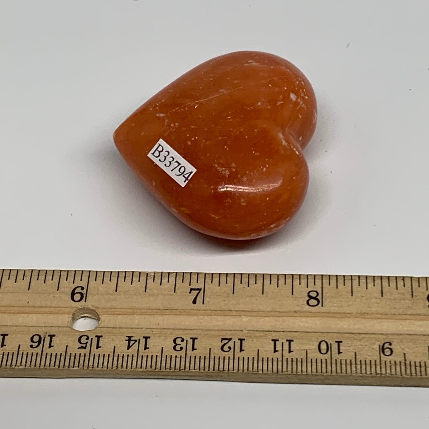 67.7g, 1.8"x2.1"x0.9" Orange Calcite Heart Gemstones from Madagascar, B33794