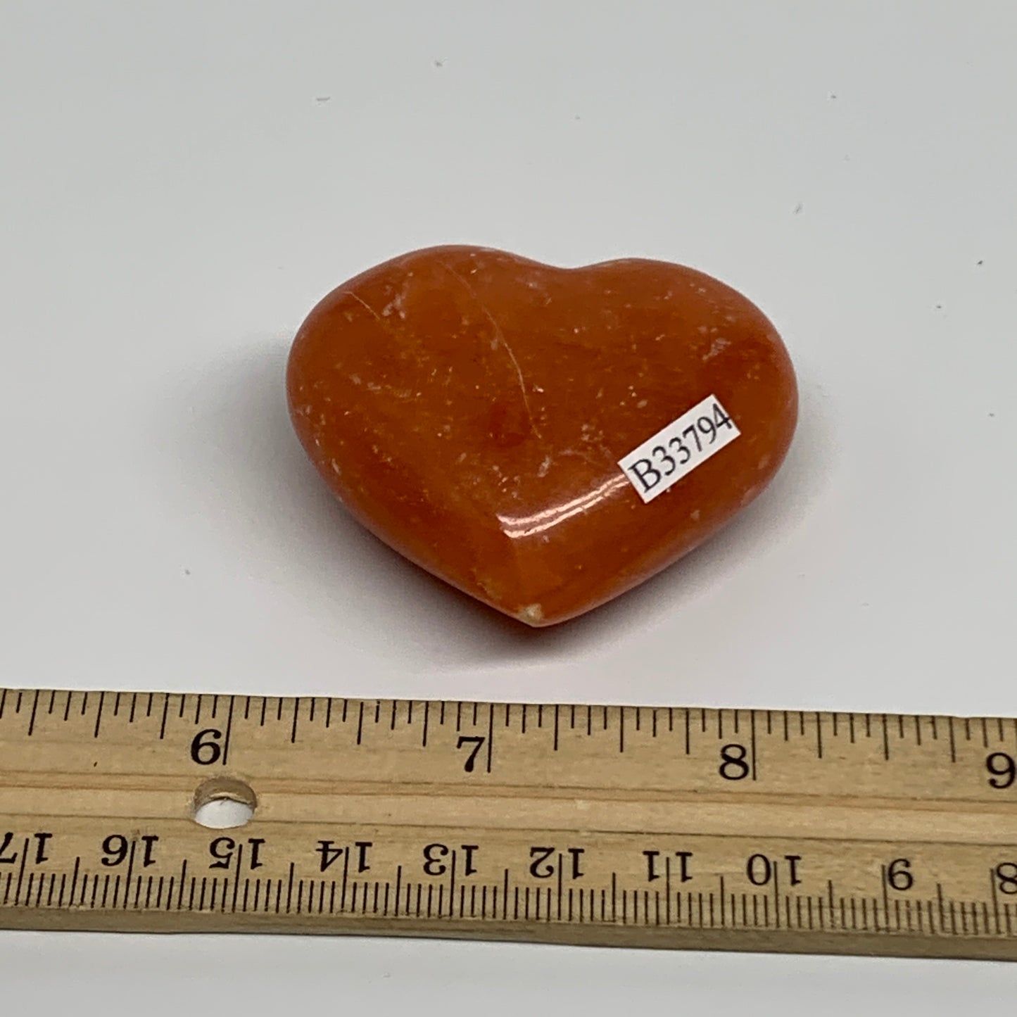 67.7g, 1.8"x2.1"x0.9" Orange Calcite Heart Gemstones from Madagascar, B33794