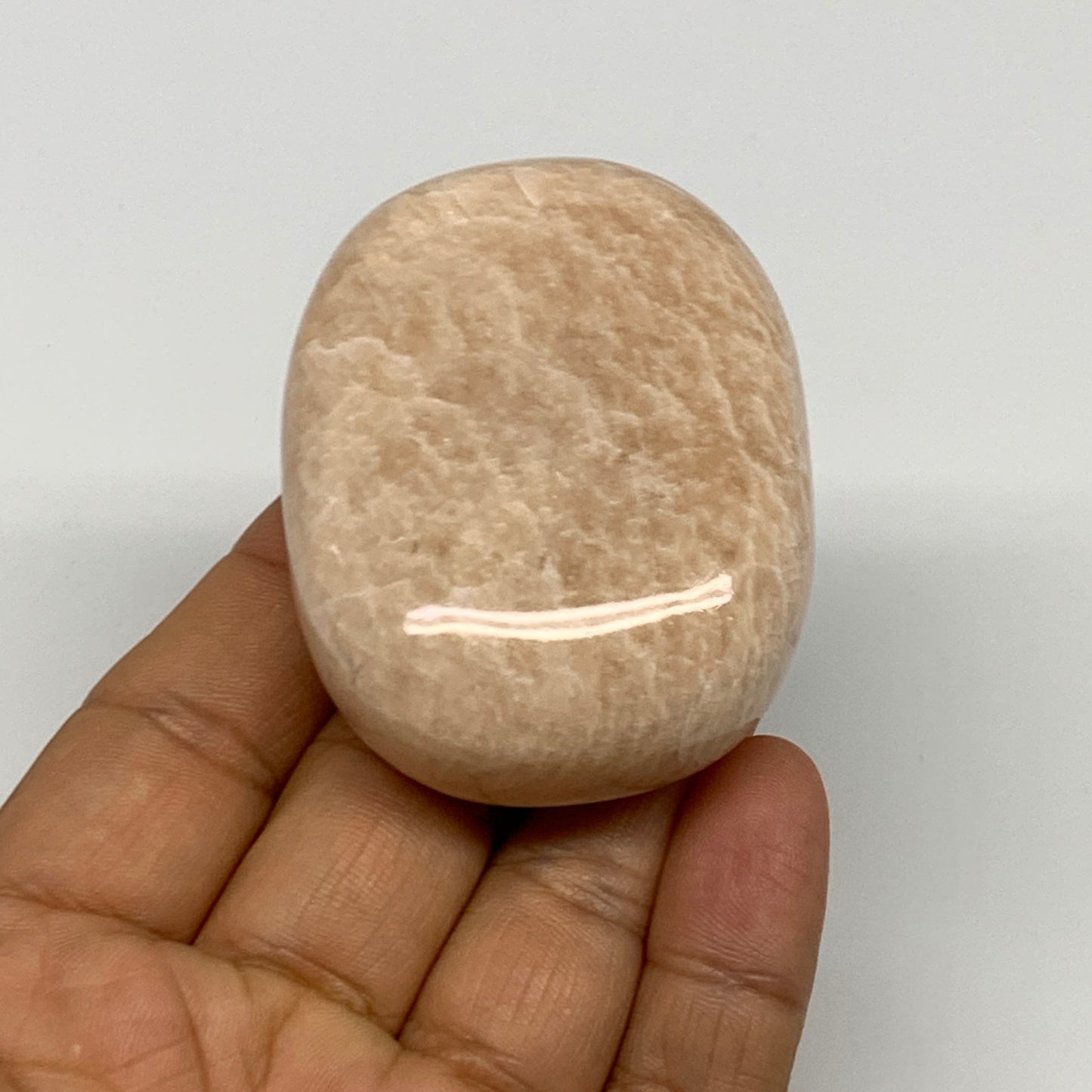 111.7g,2.3"x1.8"x0.9" Peach Moonstone Crystal Palm-Stone Polished Reiki, B27983