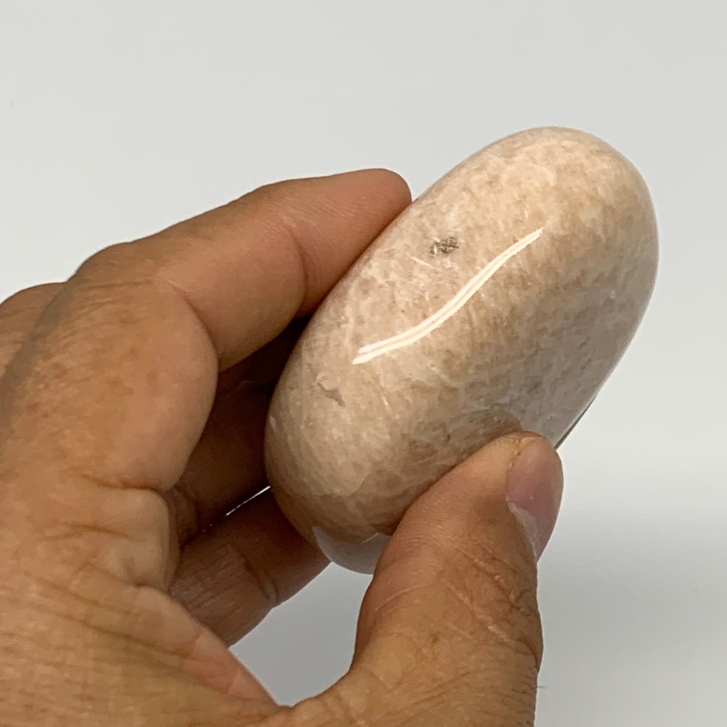 111.7g,2.3"x1.8"x0.9" Peach Moonstone Crystal Palm-Stone Polished Reiki, B27983