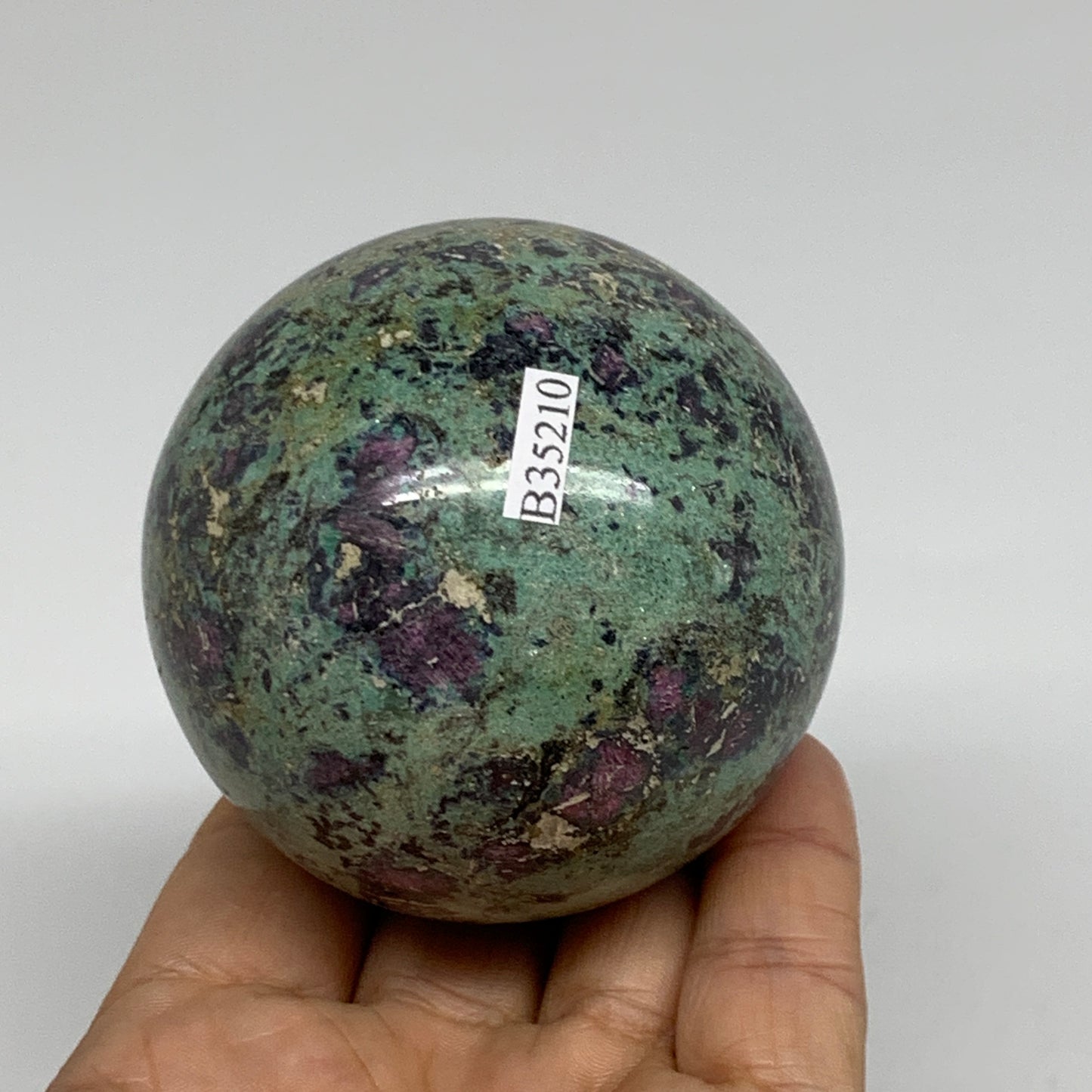 0.97 lbs, 2.5"(64mm), Zoisite with Ruby Sphere Sphere Ball Crystal, B25210