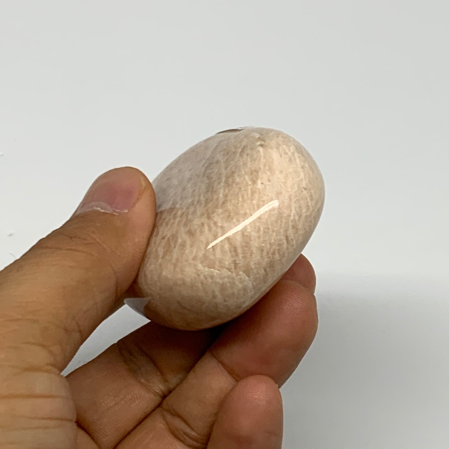 111.7g,2.3"x1.8"x0.9" Peach Moonstone Crystal Palm-Stone Polished Reiki, B27983