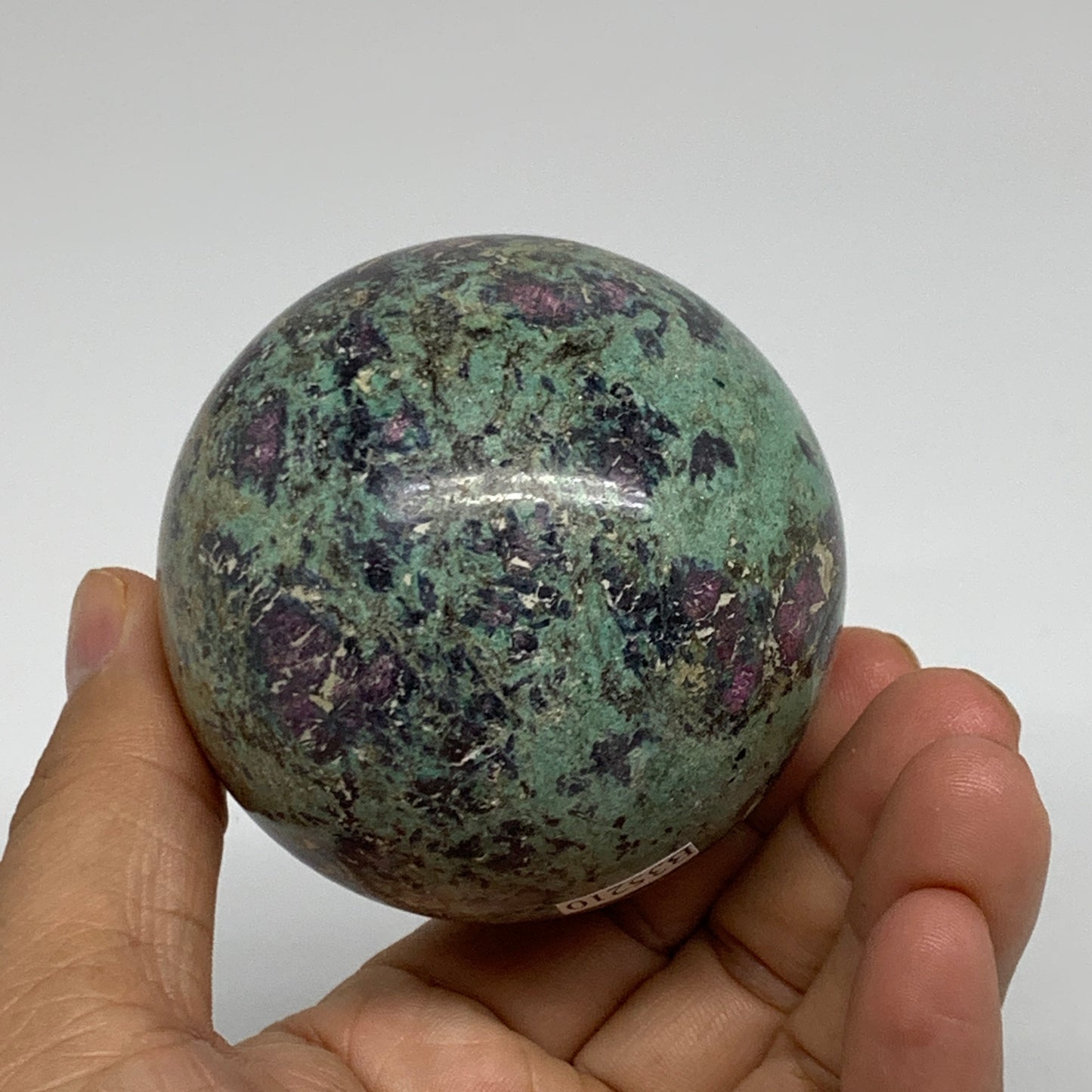 0.97 lbs, 2.5"(64mm), Zoisite with Ruby Sphere Sphere Ball Crystal, B25210