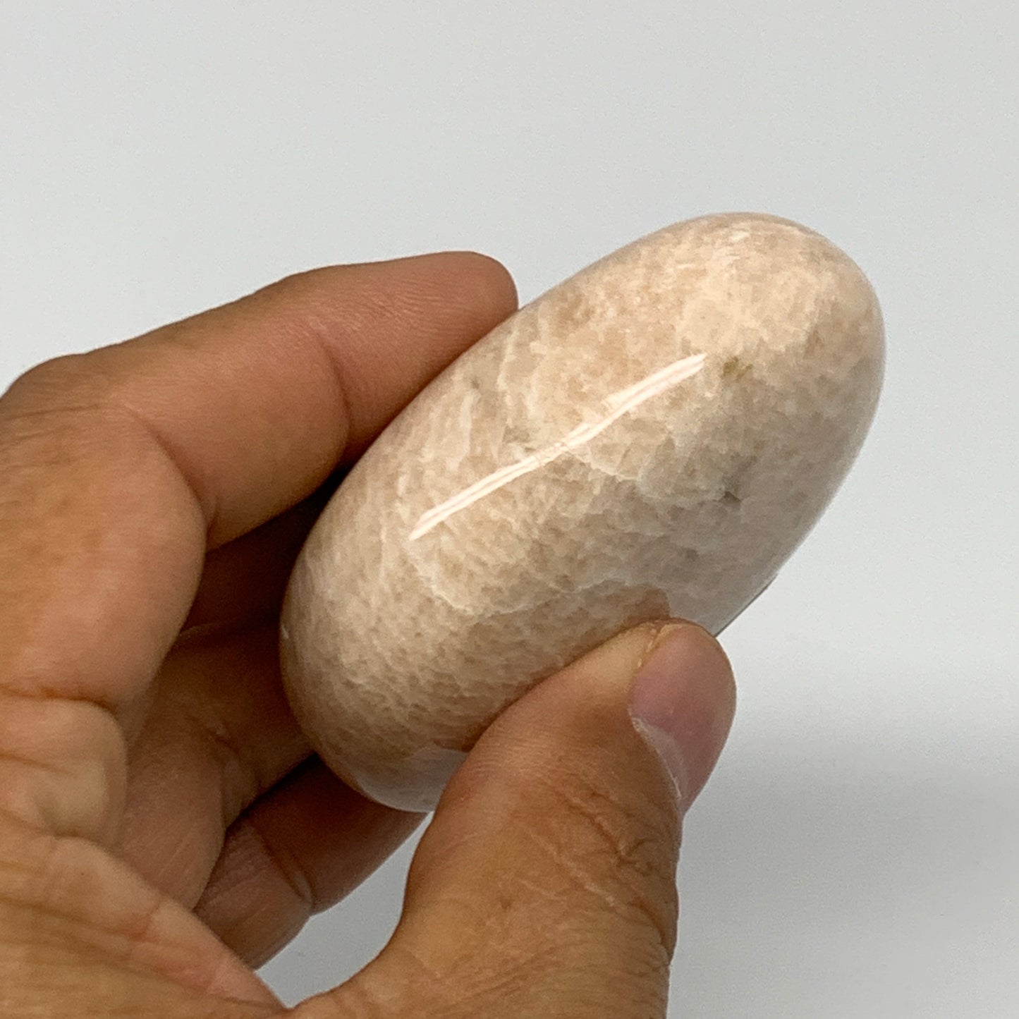 103.6g,2.3"x1.7"x0.9" Peach Moonstone Crystal Palm-Stone Polished Reiki, B27985