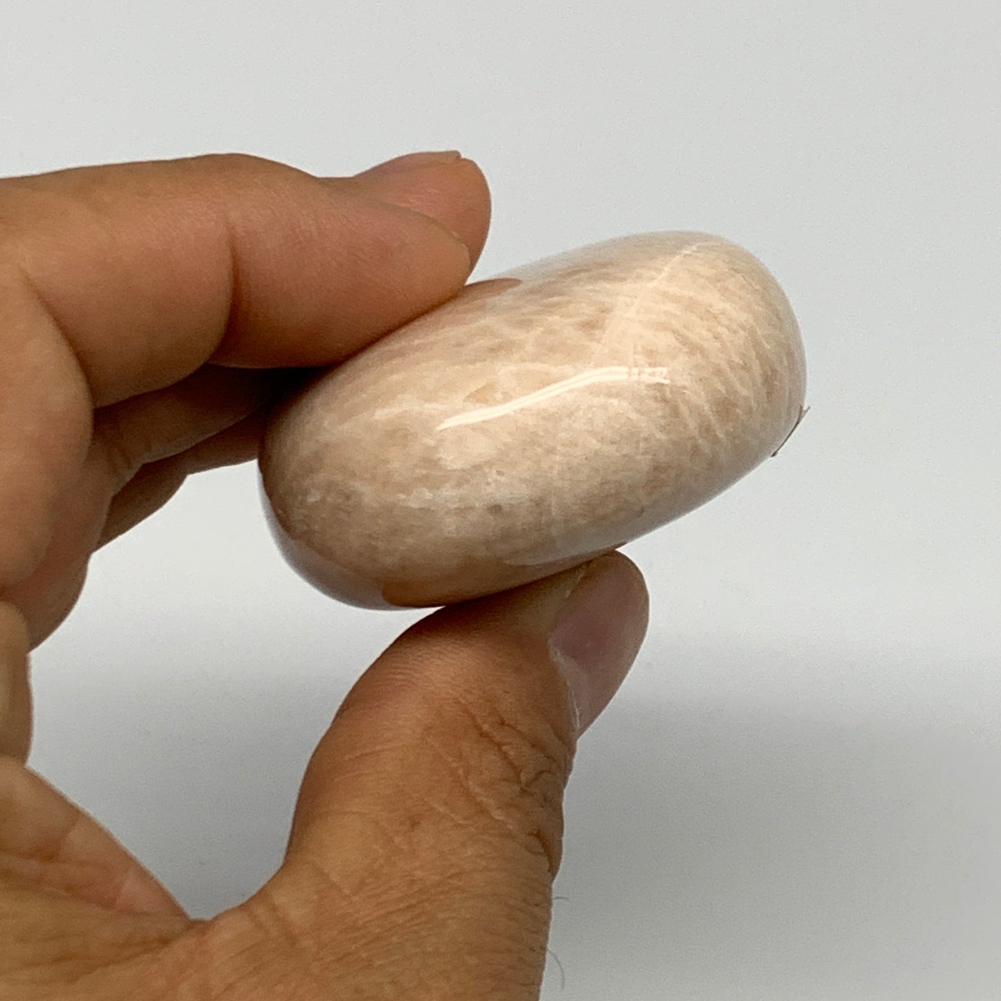 103.6g,2.3"x1.7"x0.9" Peach Moonstone Crystal Palm-Stone Polished Reiki, B27985