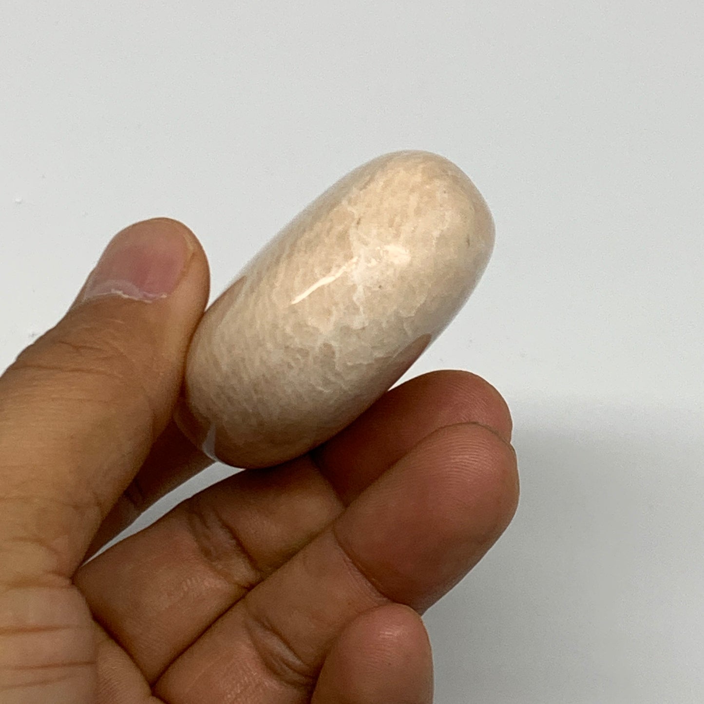 103.6g,2.3"x1.7"x0.9" Peach Moonstone Crystal Palm-Stone Polished Reiki, B27985