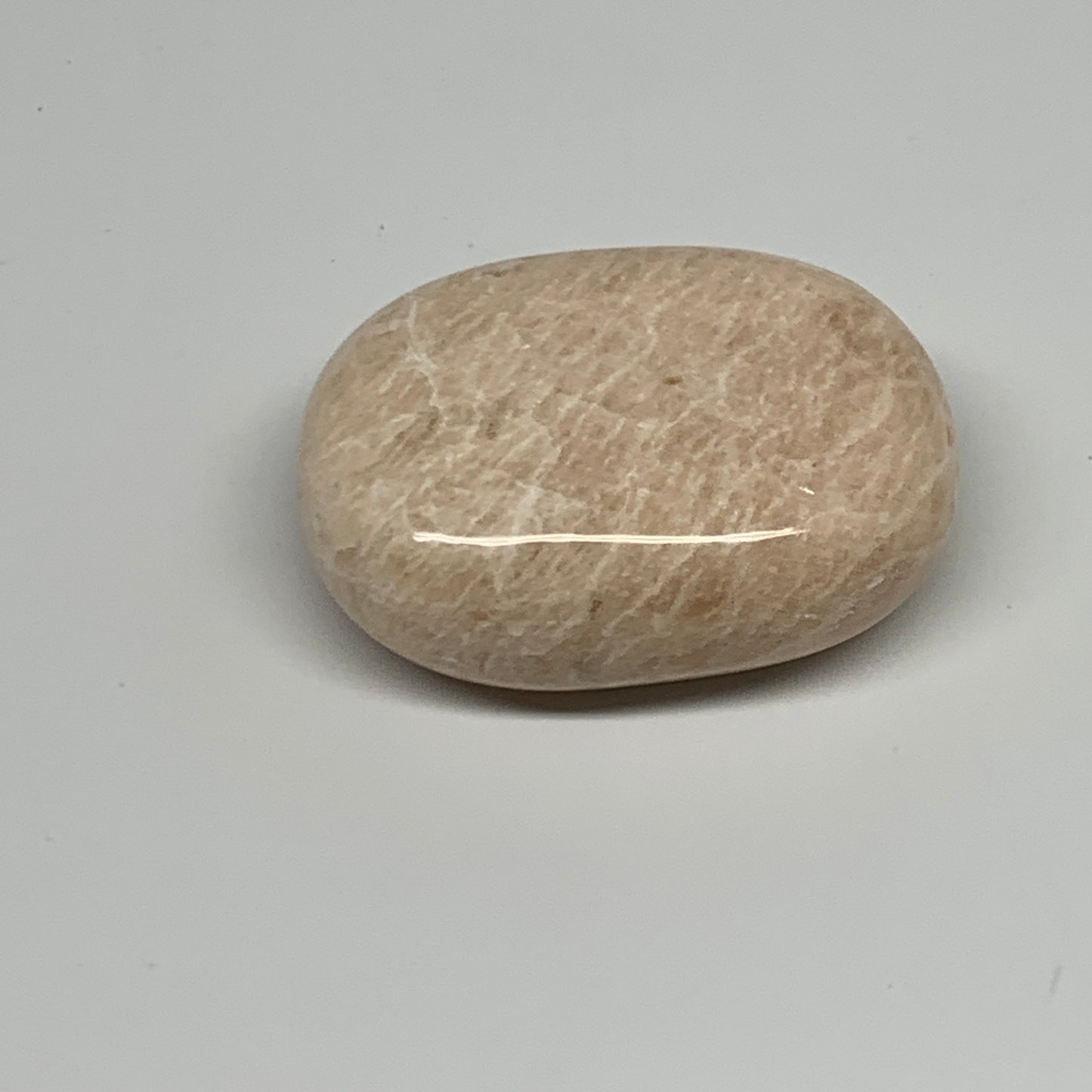 103.6g,2.3"x1.7"x0.9" Peach Moonstone Crystal Palm-Stone Polished Reiki, B27985