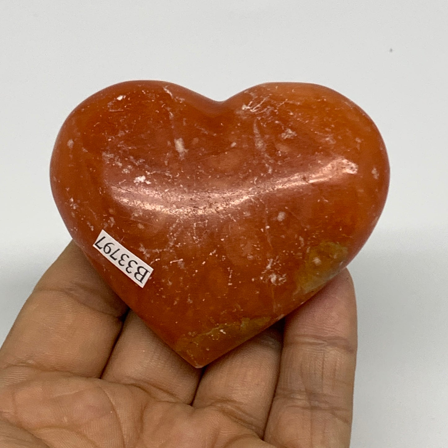 115.8g,2.3"x2.7"x0.9" Orange Calcite Heart Gemstones from Madagascar, B33797